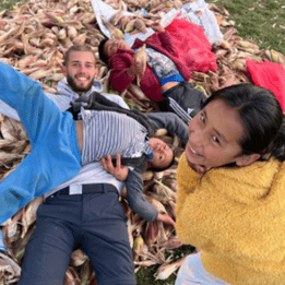 Volunteers playing with children